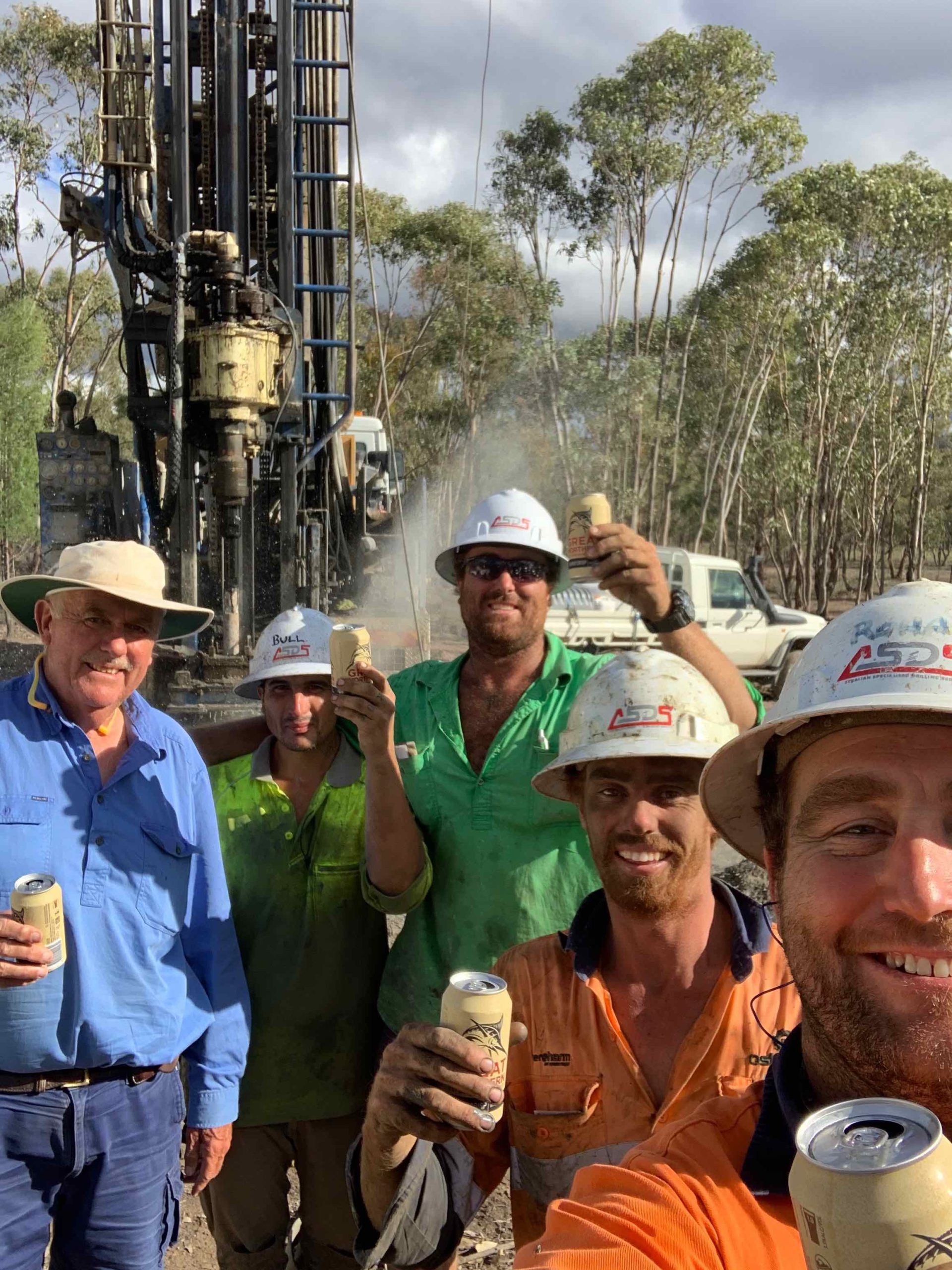 Happy Farmer and water drillers- we hit water!