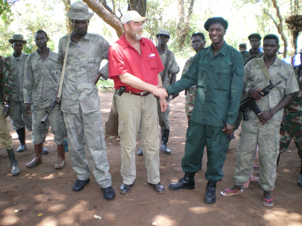 LRA Militia shaking hands w Lawrence Anthony